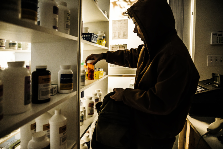 A young male stealing prescriptions